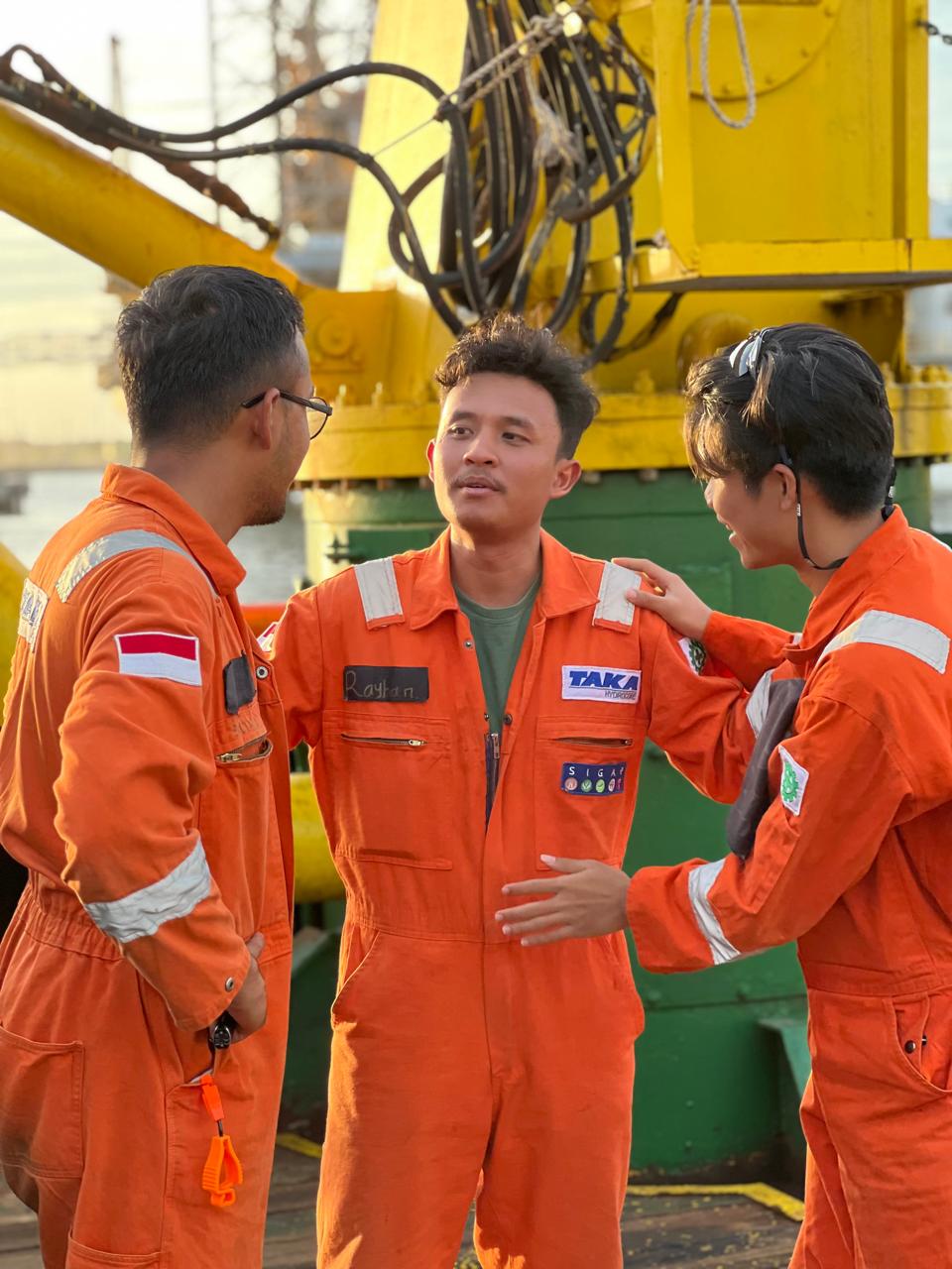 Taka Group Management Trainee young engineers on vessel deck